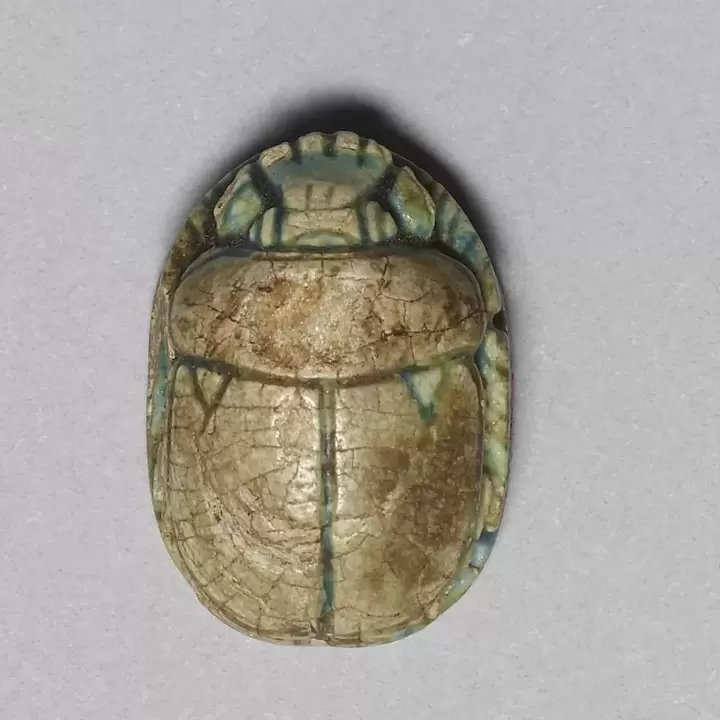 amulet for held-scarab